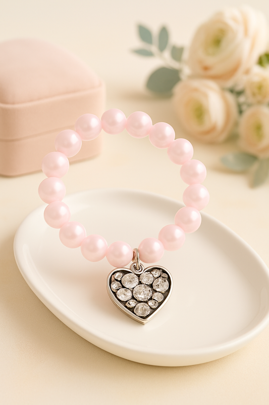 Corazón de devoción con perlas