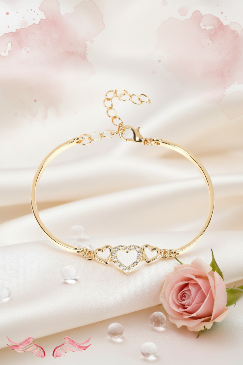 Gold trio open-heart bracelet vanity focus