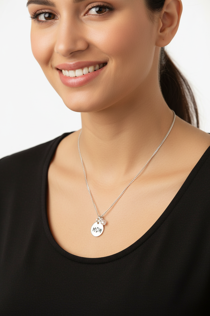 Model wearing MOM disc necklace with pearl