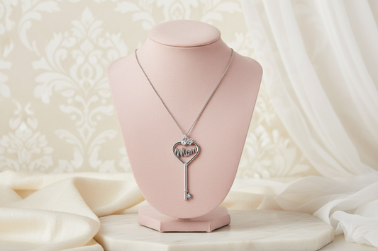 Mom heart key necklace with rhinestones on blush vanity